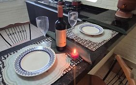 Flat na área central de Valadares Com AR garagem wifi cozinha completa para grupos ou casais
